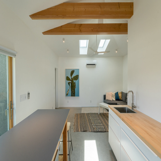 A minimalist living space with skylights