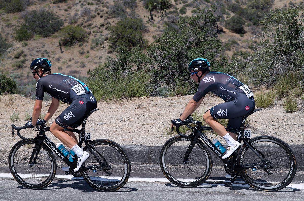 Jon Dibben with Sky teammate Elia Viviani on his wheel