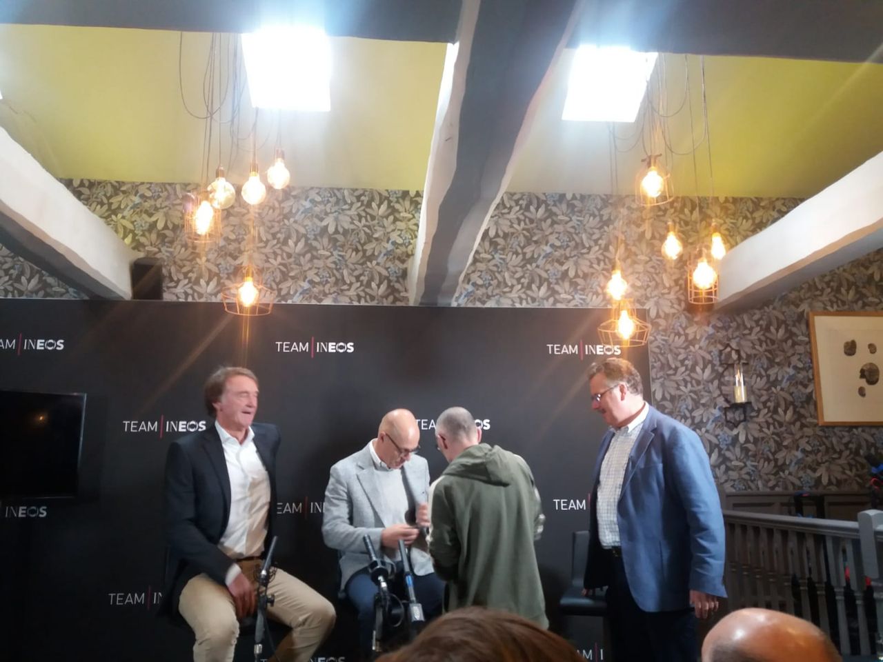 Jim Ratcliffe and Dave Brailsford prepare for the press conference at the Team Ineos launch