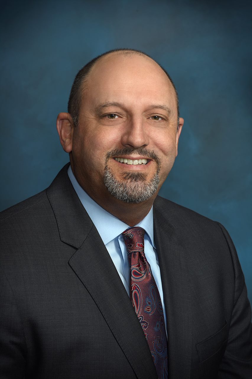 Headshots of Antonio Dias and Douglas Schoenherr.
