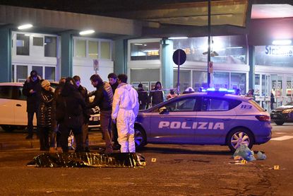 Italian police in Milan, where the Berlin attacker was shot