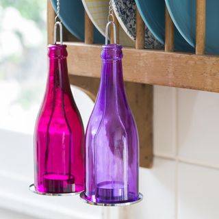 sugar and water traps with purple and pink bottles