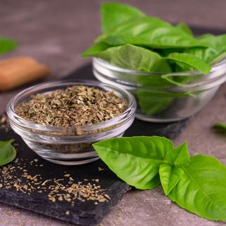 Dried and fresh basil on countertop