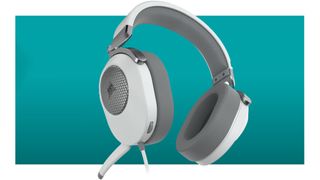 The Corsair HS65, a wired gaming headset in white and grey, floats in a teal void.