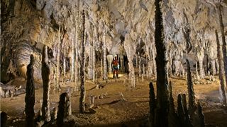 Andrew Northall at Sala de los Fantasmas (Room of the Ghosts), Coventosa Cave, Cantabria, Spain. Photographed by Sam Davis