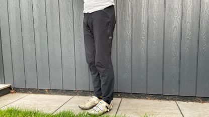 Male cyclist wearing the Rapha Explore Pants