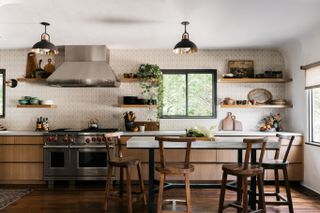 kitchen with high wood stools at a high table