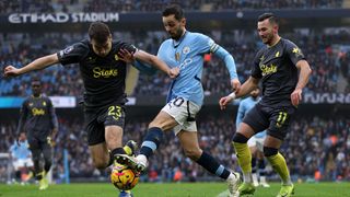 Seamus Coleman of Everton, Bernardo Silva of Manchester City and Jack Harrison of Everton in action during the Premier League match between Manchester City FC and Everton FC at Etihad Stadium on December 26, 2024 in Manchester,