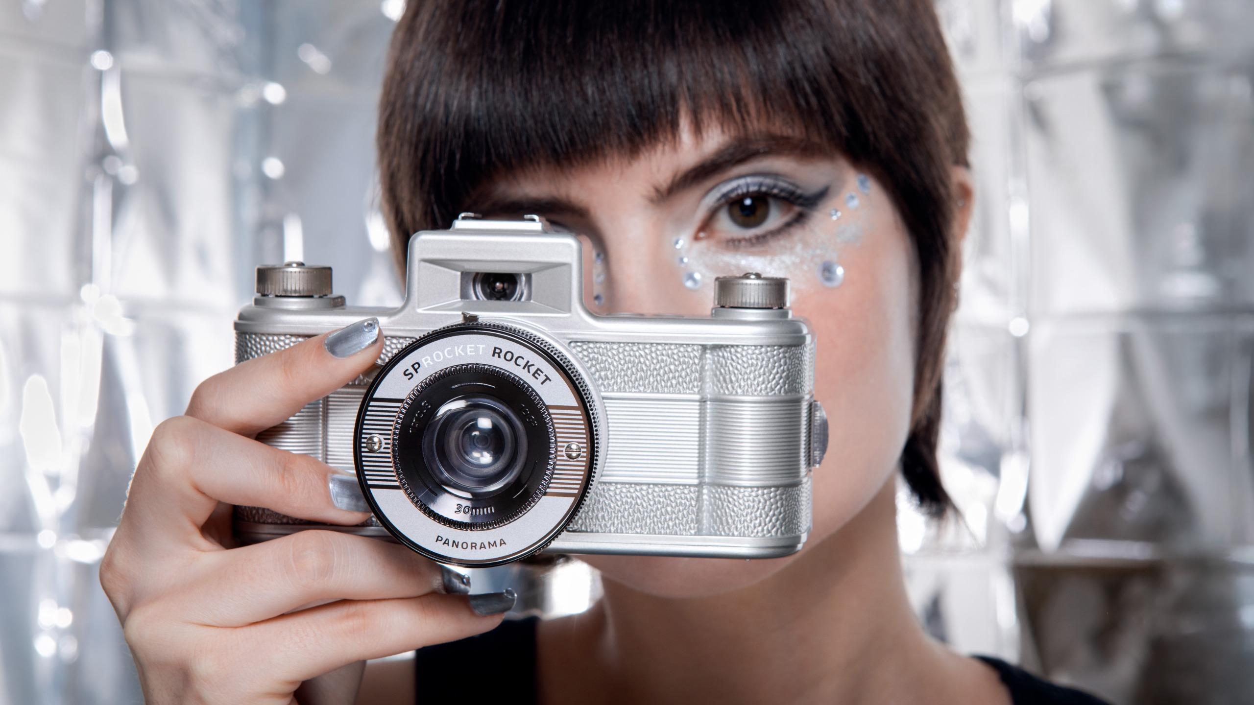 The Lomography Sprocket Rocket in a person's hands