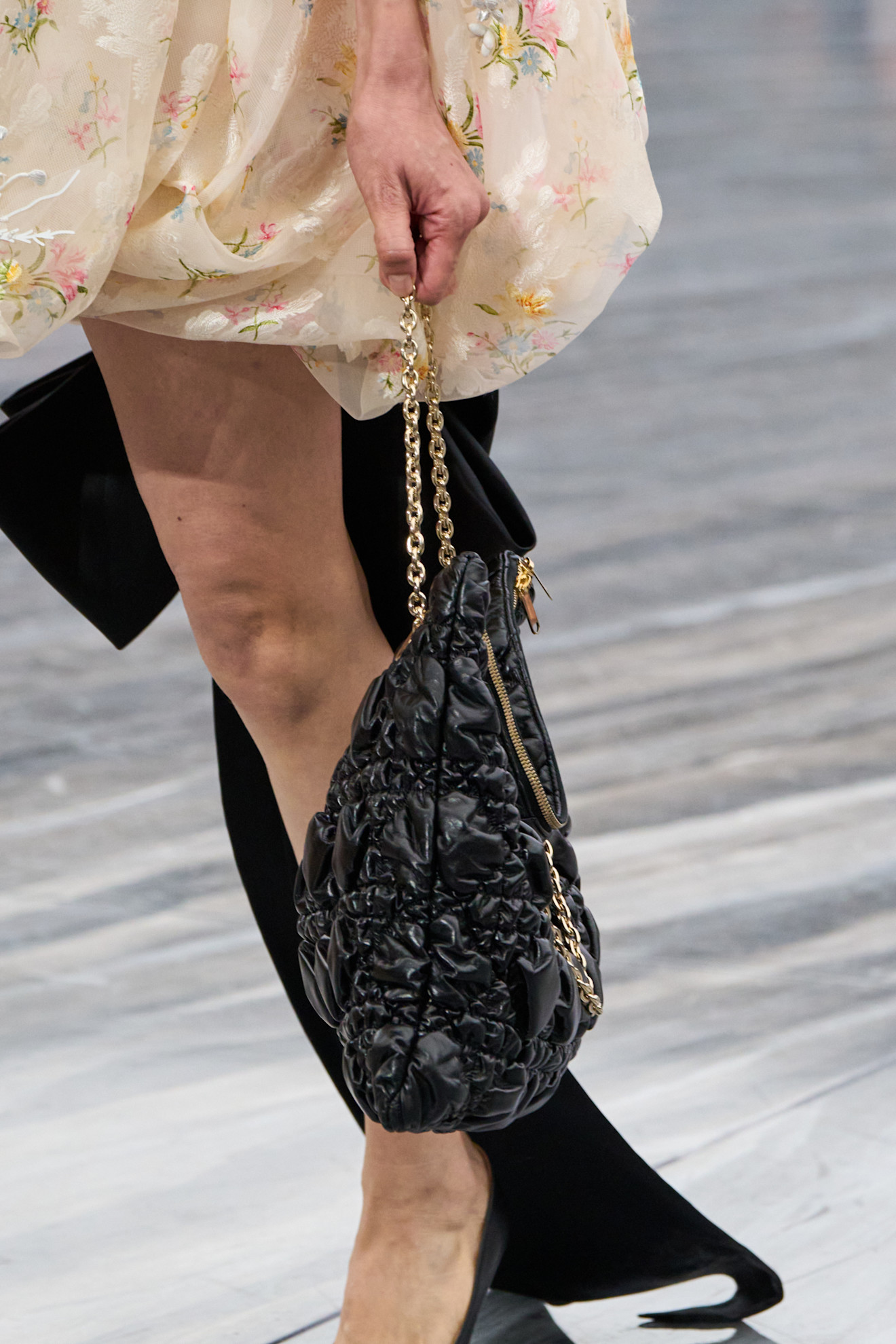 A model carried Rihanna's quilted dior bag on the spring 2026 runway