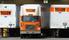 Three large trucks with the Yellow logo