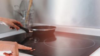 An induction cooktop being switched on