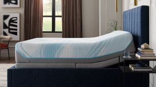 A side view showing the Tempur-Pedic Tempur-ActiveBreeze Smart Bed mattress on an adjustable base in a bedroom