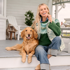 woman wearing a jumper with dog