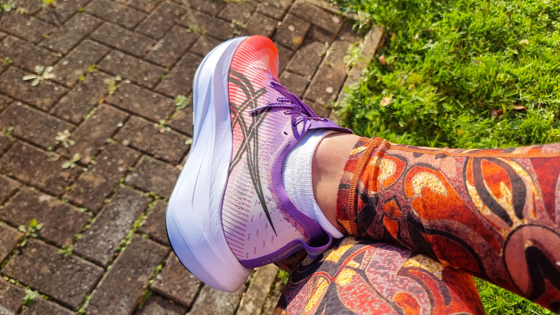 A close-up picture of our reviewer wearing the Asics Megablast running shoes