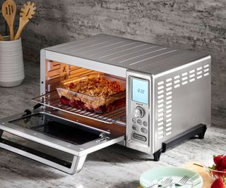 A stainless steel countertop oven in stainless steel