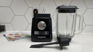 The components of the Magimix Power Blender on a kitchen countertop