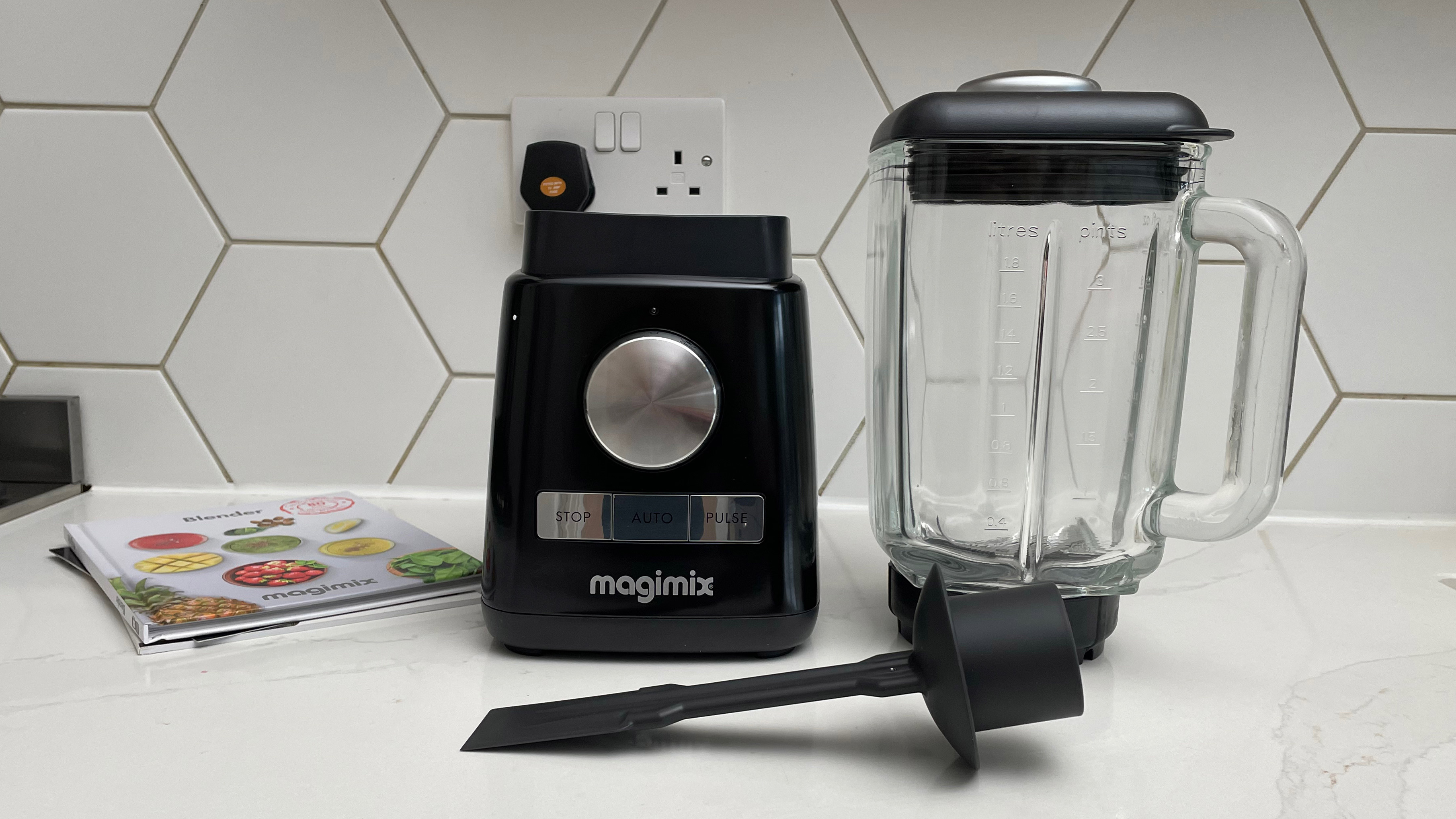 The components of the Magimix Power Blender on a kitchen countertop