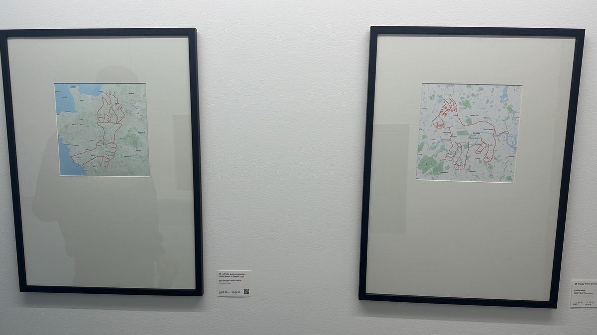 Two framed GPS artworks showing an Olympic torch in France and a donkey in London.