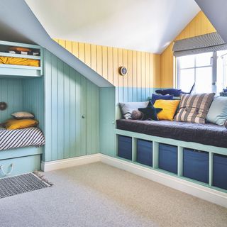 Brightly decorated converted loft space creates a fun place for kids to play and have sleepovers