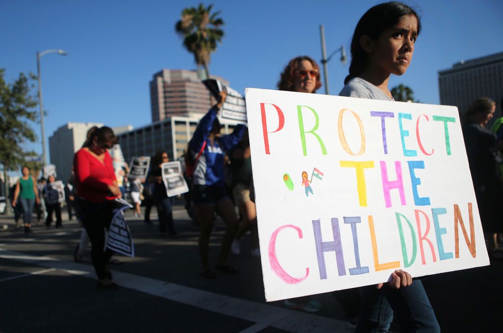 Protesters demonstrating against family separation.