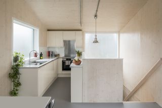 kitchen inside Forest Houses by Dallas-Pierce-Quintero