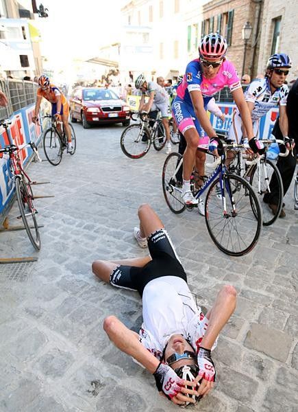 Gustav Erik Larsson (Team CSC) down and out following the climb.