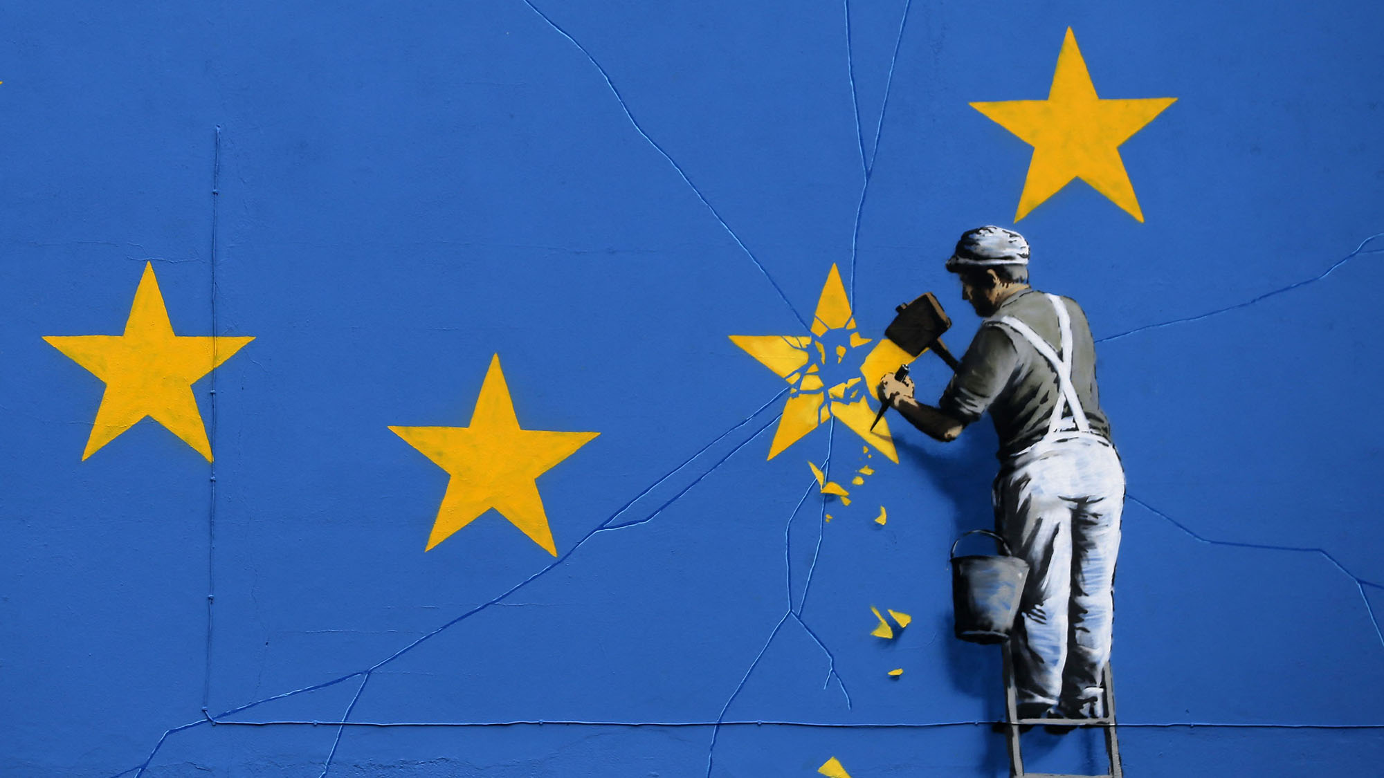 A Banksy image showing a star being chipped off the EU flag
