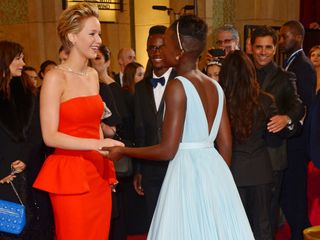 Jennifer Lawrence and Lupita Nyong'o at The Oscars 2014