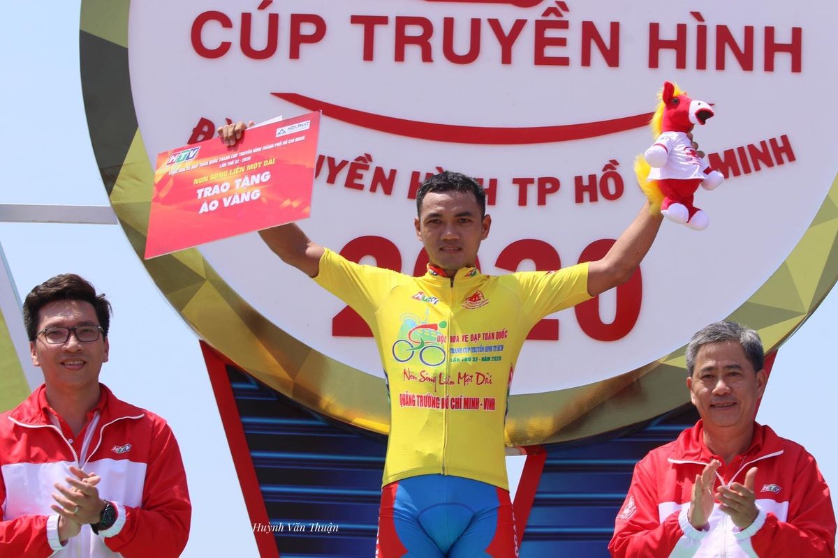 Nguyen Tan Hoai pulls on the first leader's jersey of the 18-stage race