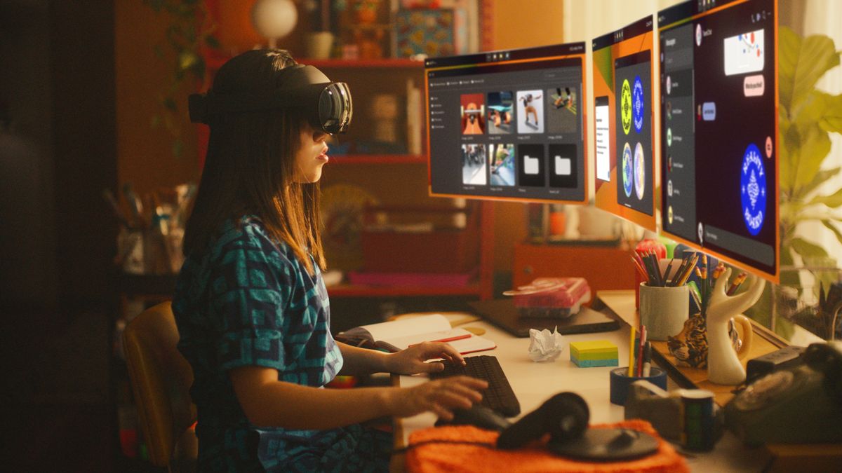 A worker using VR to work in the metaverse using multiple virtual displays