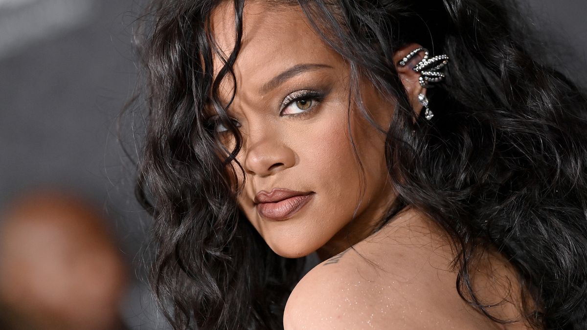 Rihanna looks into the camera at the Black Panther Wakanda Forever world premiere.