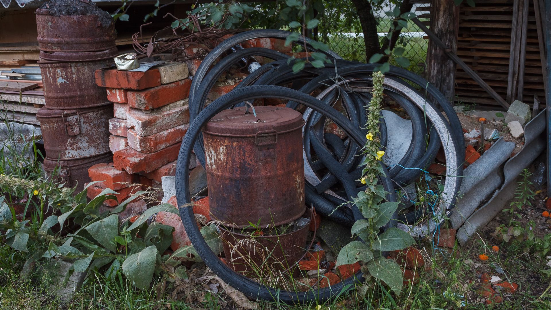 picture of rubbish piled up in back garden