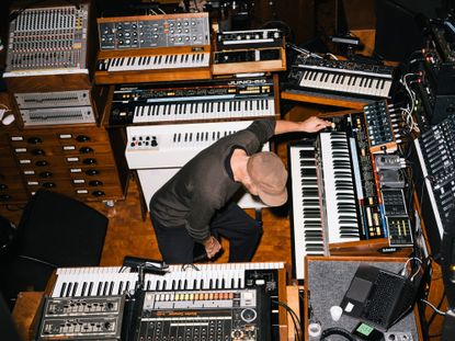 Musician and Wallpaper* Design Awards 2023 judge Nils Frahm surrounded by keyboards