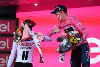 MILANO ITALY OCTOBER 25 Podium Jai Hindley of Australia and Team Sunweb Tao Geoghegan Hart of The United Kingdom and Team INEOS Grenadiers Pink Leader Jersey Celebration Social distancing during the 103rd Giro dItalia 2020 Stage 21 a 157km Individual time trial from Cernusco sul Naviglio to Milano ITT girodiitalia Giro on October 25 2020 in Milano Italy Photo by Tim de WaeleGetty Images