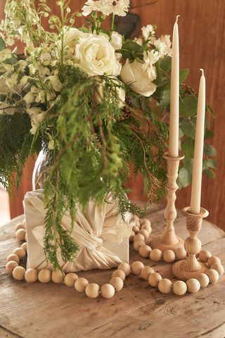 Christmas flower arrangements white and green by Lynde Galloway