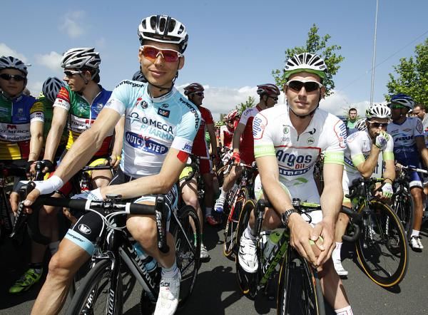 Tony Martin back in the game after being hit by a car, with John Degenkolb, last year's winner
