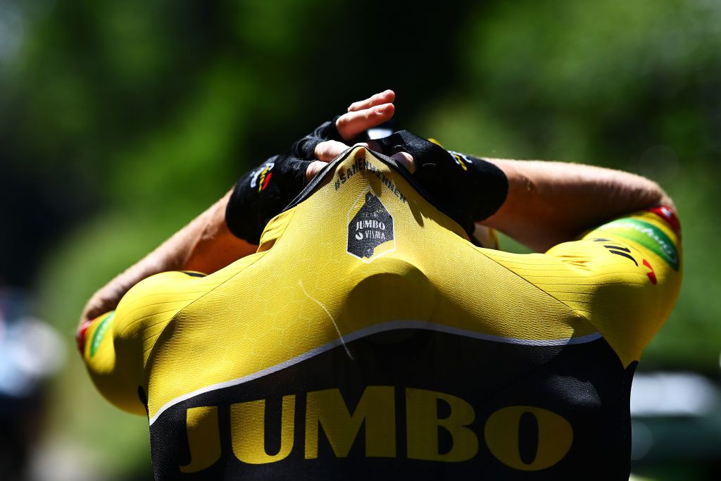 GRENCHEN SWITZERLAND JUNE 14 A rider Team Jumbo Visma picks bottles during the 85th Tour de Suisse 2022 Stage 3 a 1769km stage from Aesch to Grenchen ourdesuisse2022 WorldTour on June 14 2022 in Grenchen Switzerland Photo by Tim de WaeleGetty Images