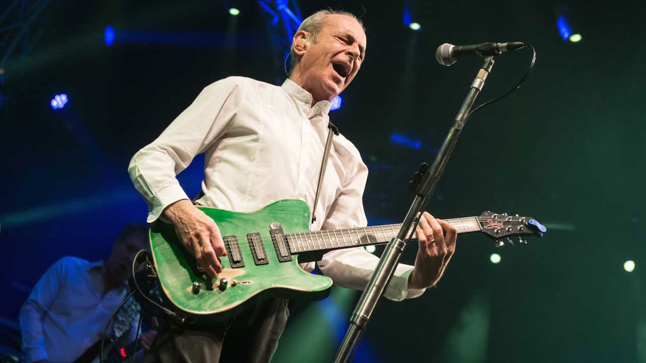 A shot of Francis Rossi on stage