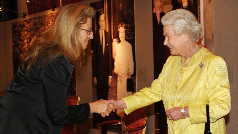 Queen Elizabeth ll greets photographer Annie Leibovitz at a reception for Americans based in Britain at Buckingham Palace on March 27, 2007 in London, England.