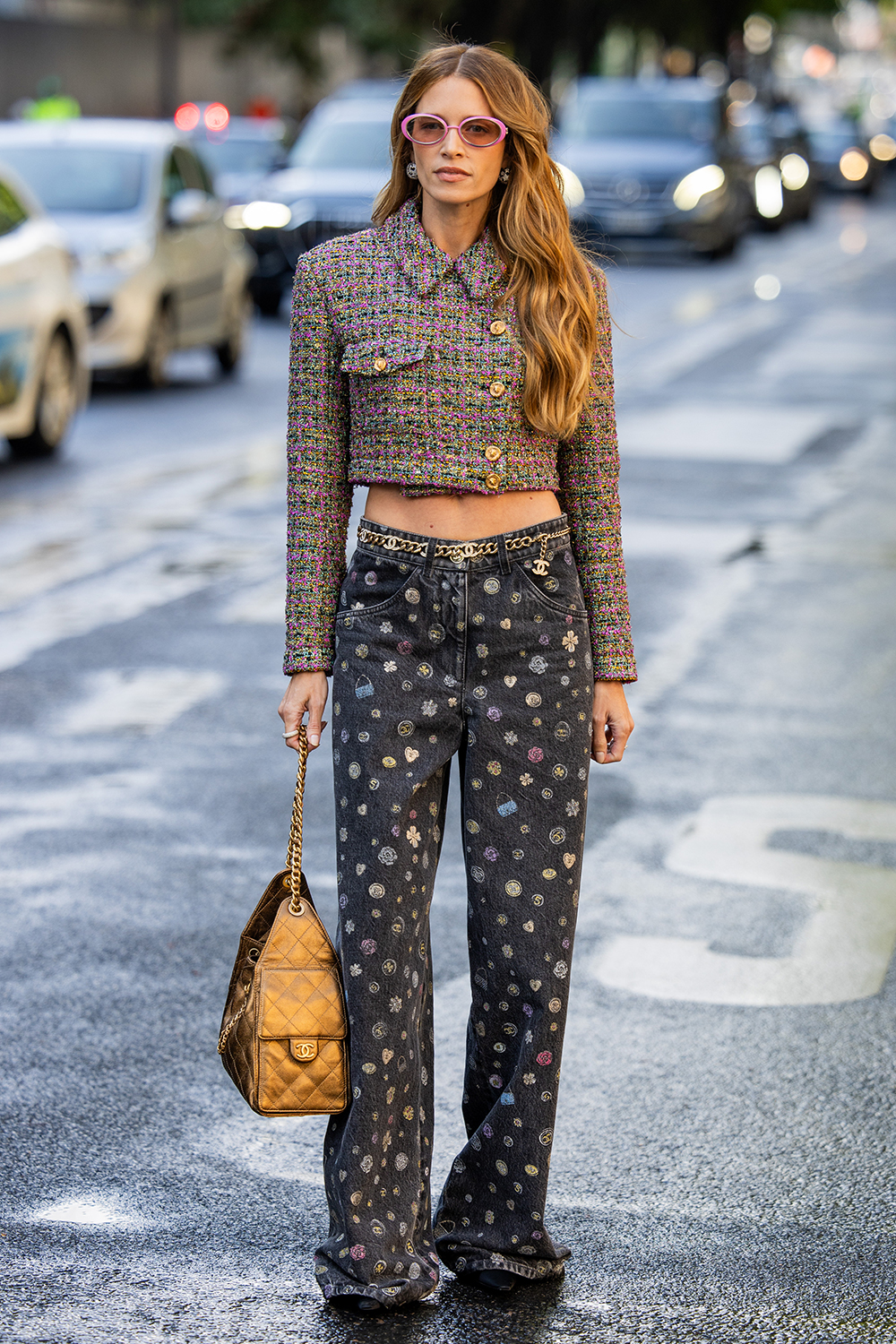 Woman wearing a Chanel outfit at Haute Couture Week in Paris.