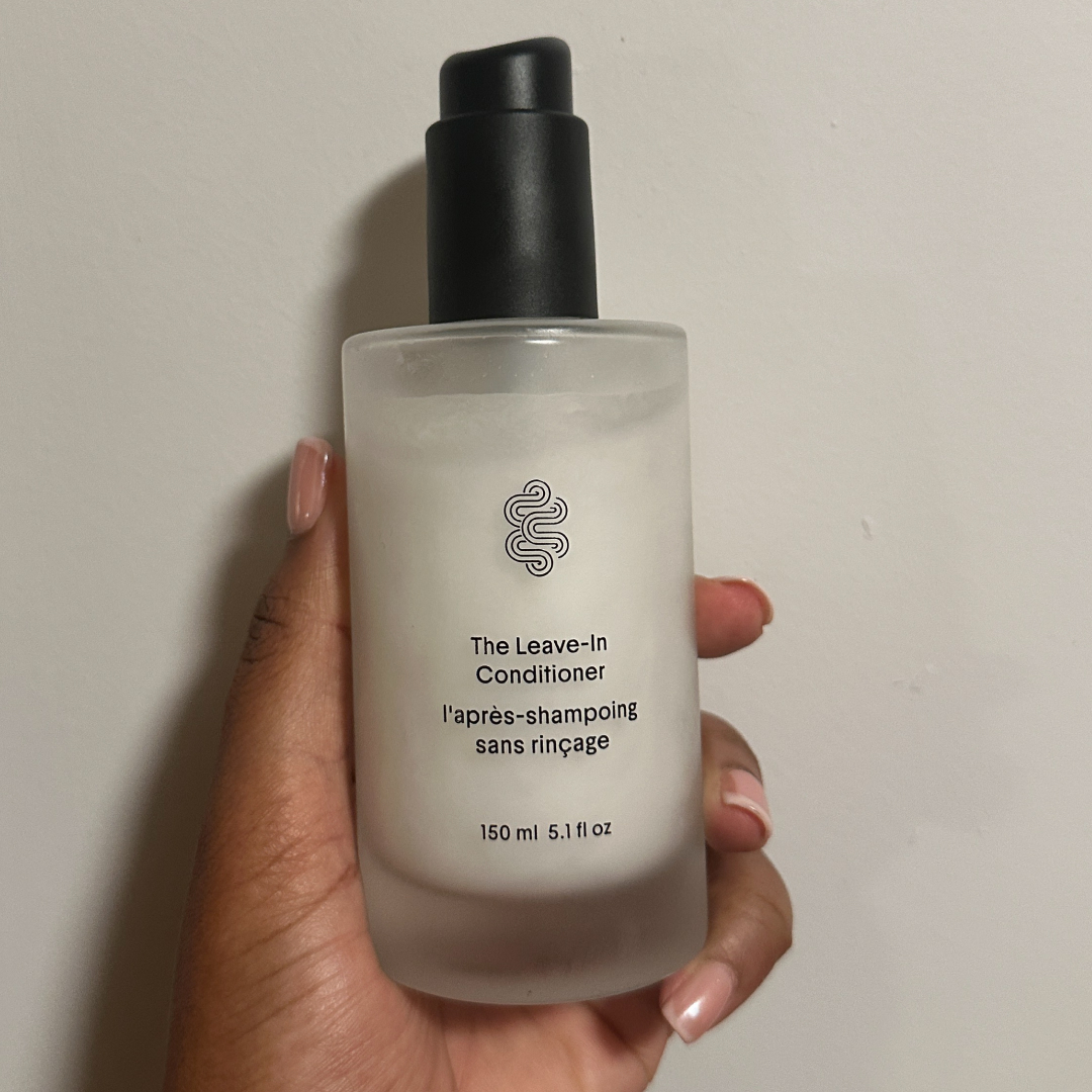 Ariel Baker testing Crown Affair The Leave-In Conditioner Cream.