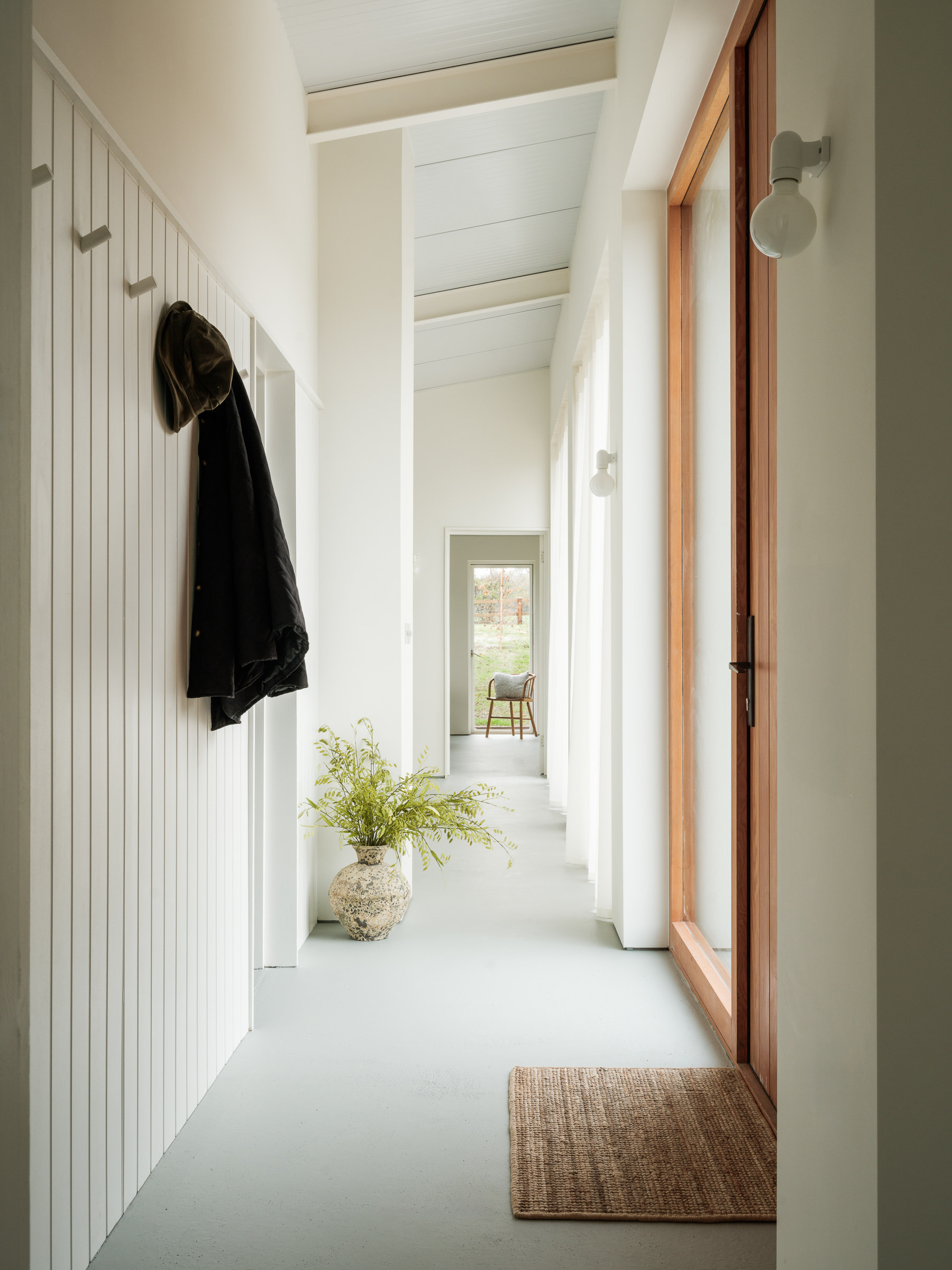 A corridor runs the length of the house