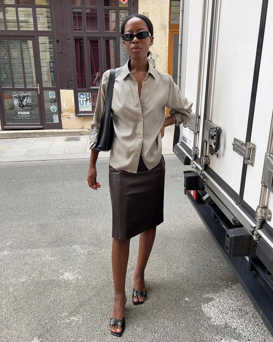 Influencer Sylvie Mus wearing a knee-length skirt.