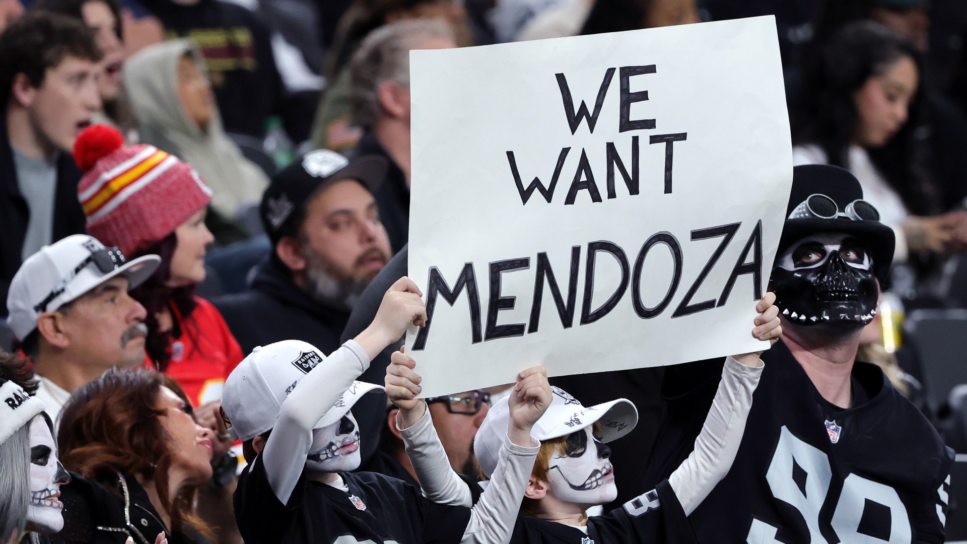 Las Vegas Raiders fans hold up a sign referencing Indiana quarterback Fernando Mendoza in the second quarter of the Raiders' game against the Kansas City Chiefs