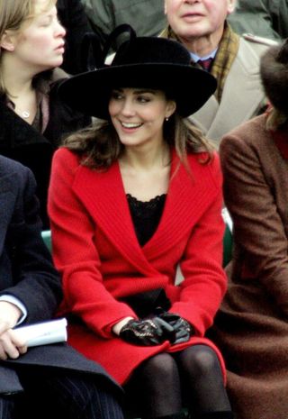 Kate Middleton wears a bright red coat to attend Prince William's pass out parade at Sandhurst on December 15, 2006