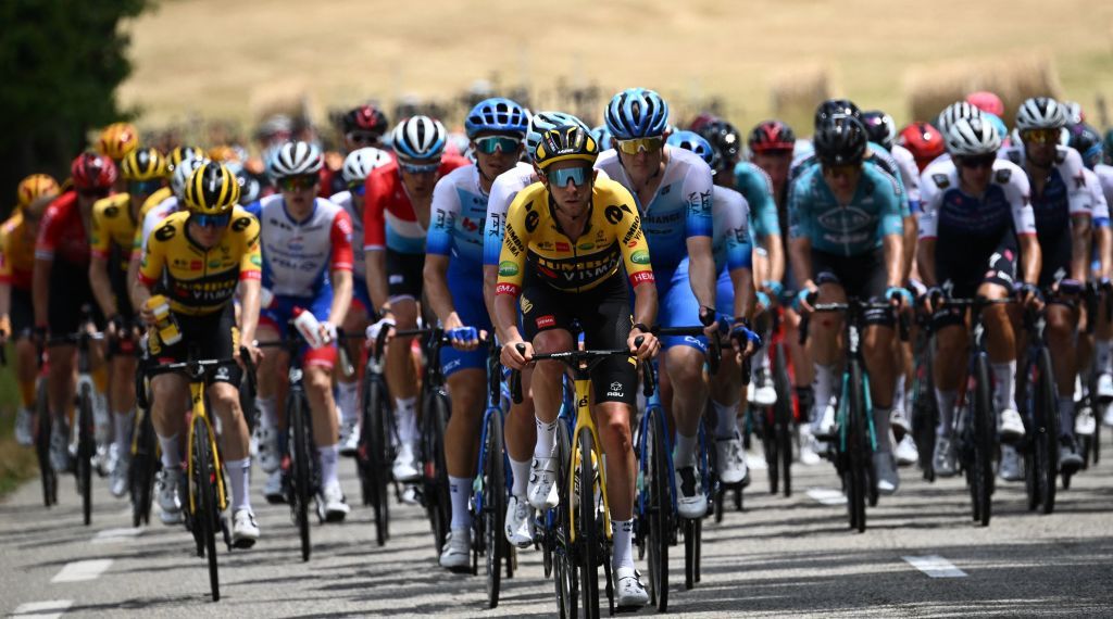JumboVisma teams Australian rider Chris Harper C leads the pack during the first stage of the 74th edition of the Criterium du Dauphine cycling race 192 km between La VoultesurRhone and Beauchastel on June 5 2022 Photo by Marco BERTORELLO AFP Photo by MARCO BERTORELLOAFP via Getty Images