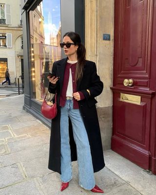 @leasy_inparis wearing wide leg jeans, cardigan and long coat