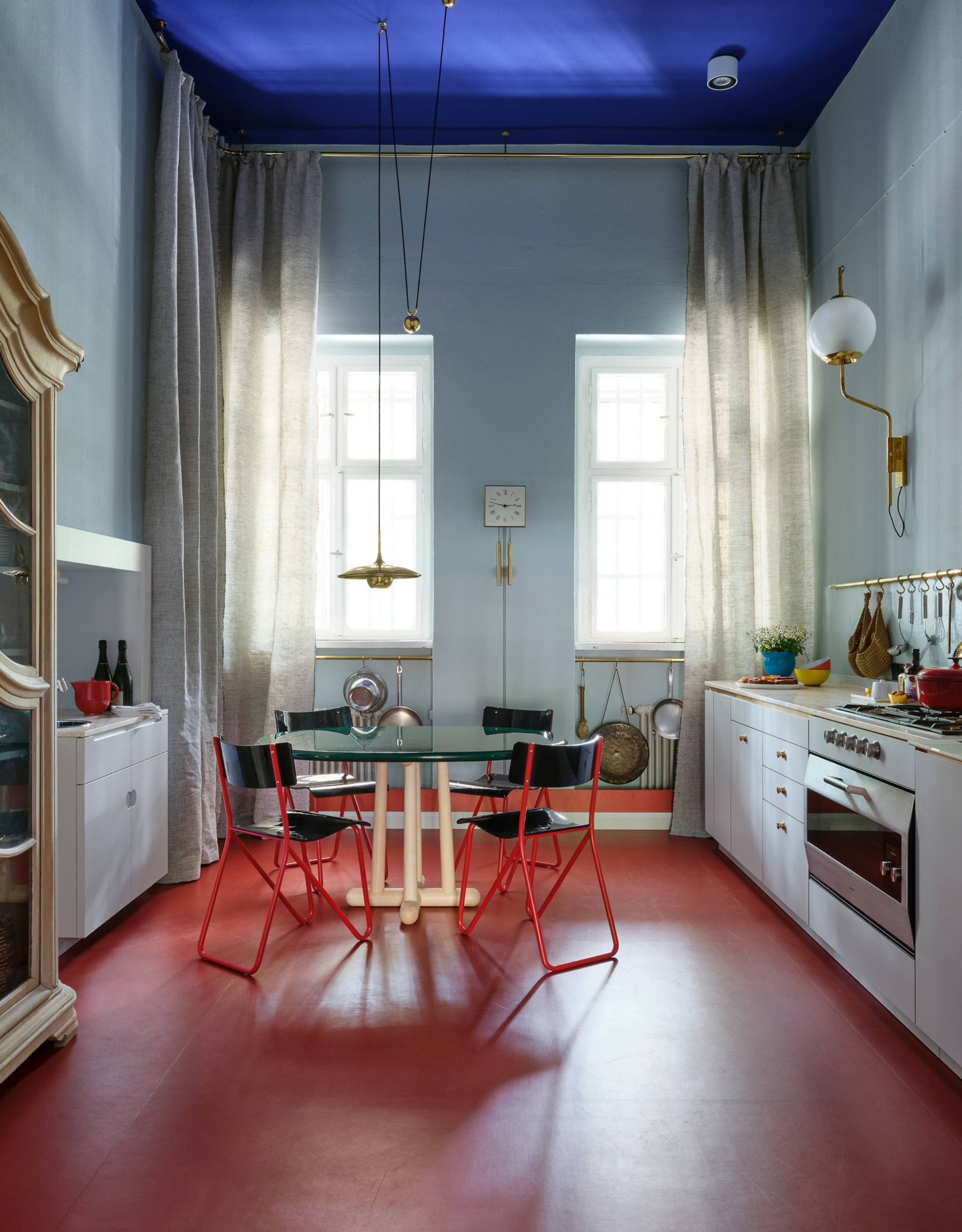 red floor kitchen with bright blue ceiling