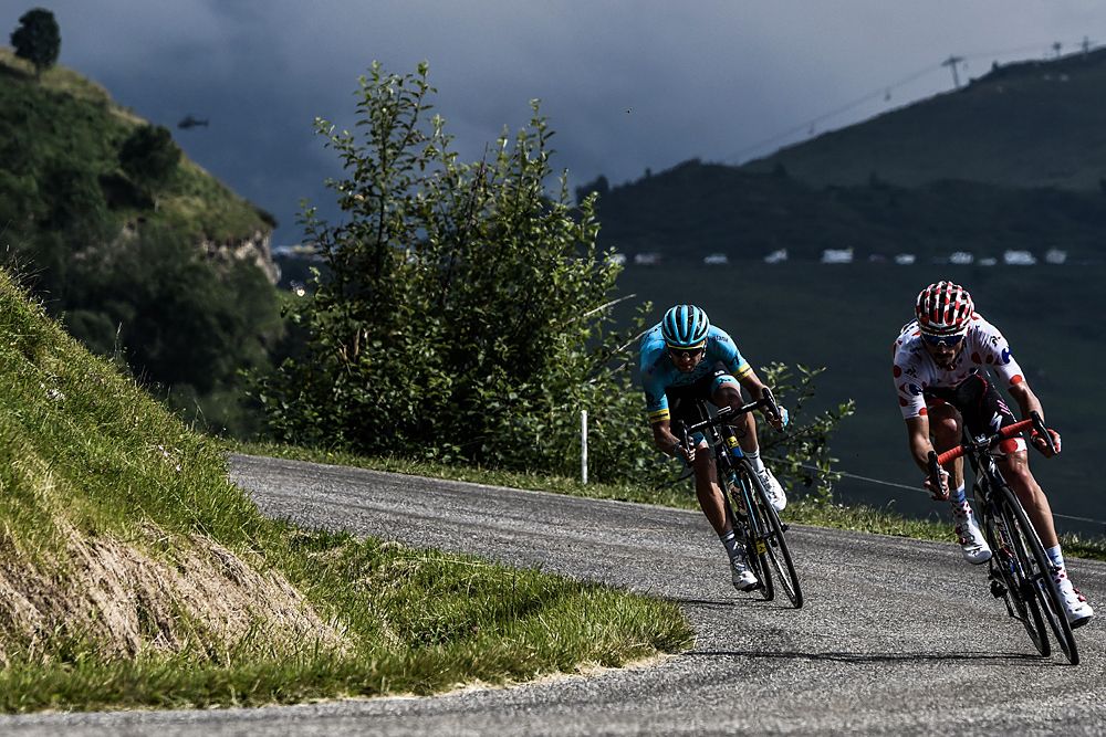 Tanel Kangert, rides down the first pass during a breakaway in the 17th stage